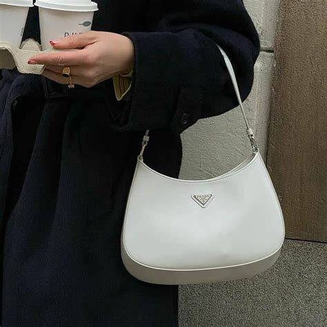 some prada bags with feet|luxury Prada bags.